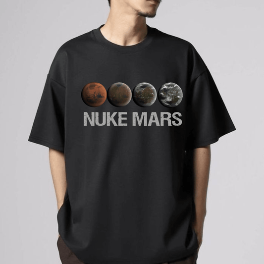 Black Nuke Mars Essential T-Shirt by Dog Mom Hat featuring SpaceX-inspired design with Elon Musk and Mars imagery.