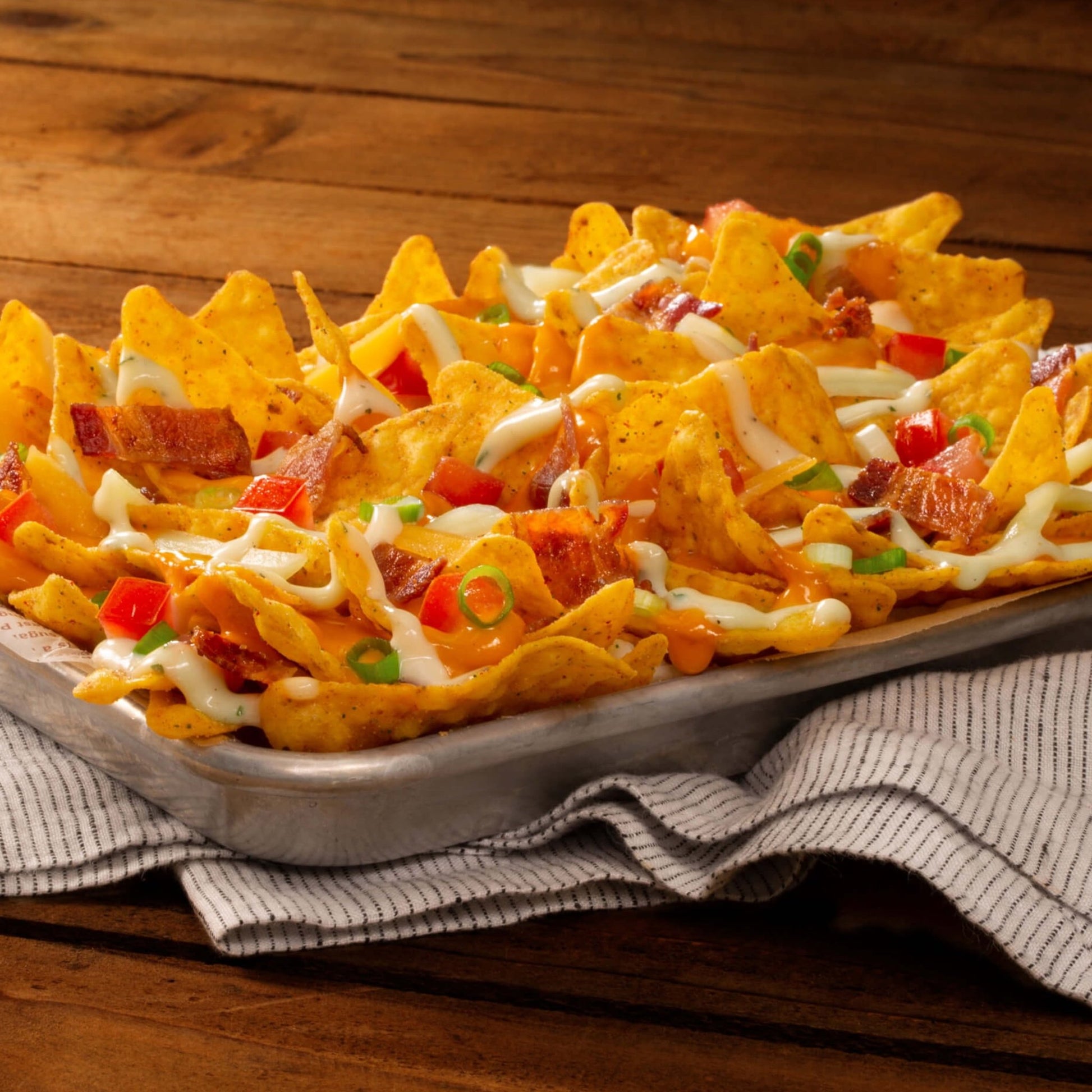 Assorted Doritos tortilla chips in 1 oz snack bags, 5 flavor variety pack with colorful bags and chips visible.