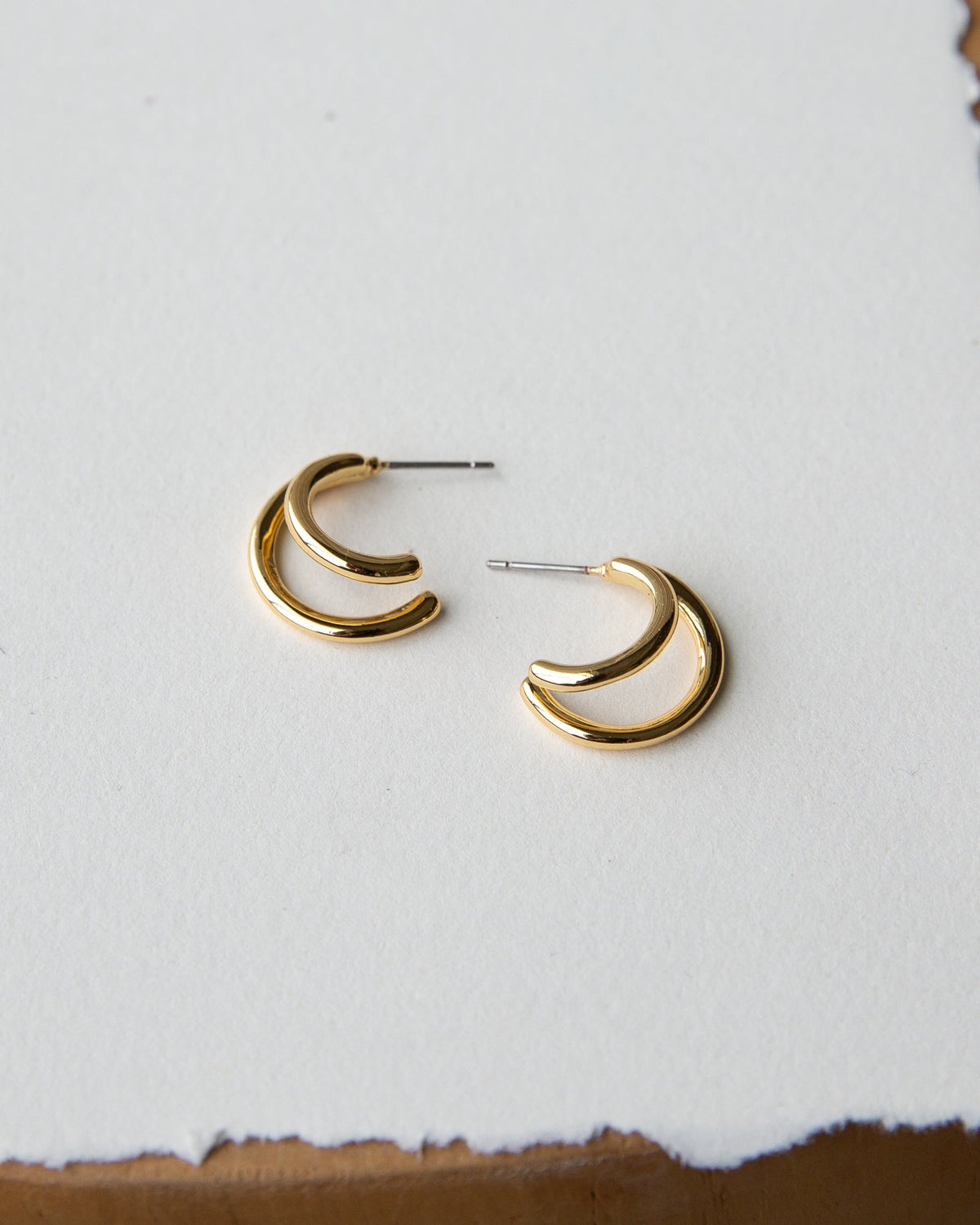 Gold double hoop earrings from Downeast, stylish earrings with a polished finish and layered hoop design.