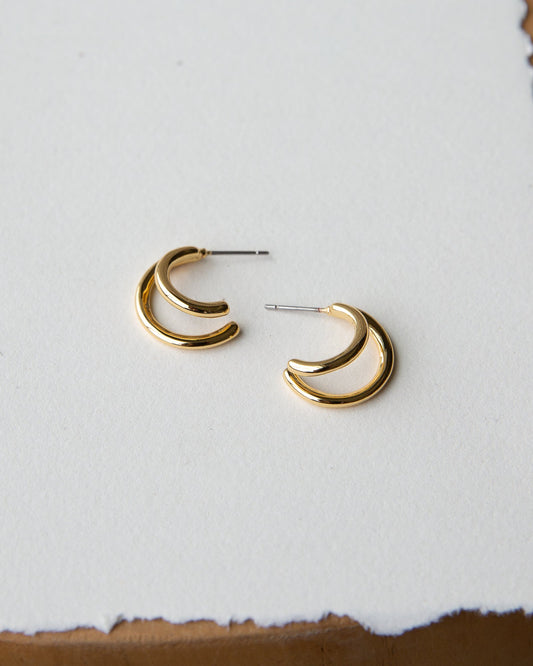 Gold double hoop earrings from Downeast, stylish earrings with a polished finish and layered hoop design.