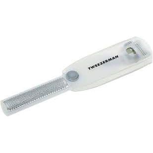 Tweezerman Safety Slide Callus Shaver and Rasp foot care tool with handle and blade for removing thick calluses and dead skin.