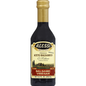 Balsamic vinegar from Alessi Di Modena displayed in a glass bottle on a white background