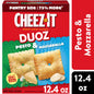 Cheez-It DUOZ Pesto and Mozzarella baked snack crackers in a 12.4 oz bag, showing crispy crackers with green pesto and cheese flavor