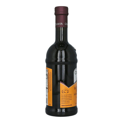 Bottle of Colavita Balsamic Vinegar of Modena IGP with dark, glossy liquid and label showing the product name and brand.