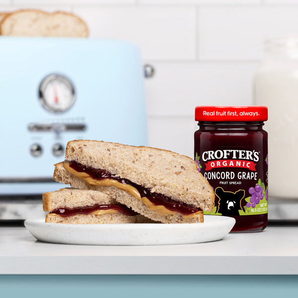 Crofter's Organic Concord Grape fruit spread jar from Duo Grocery, showing the label and lid on a white background.