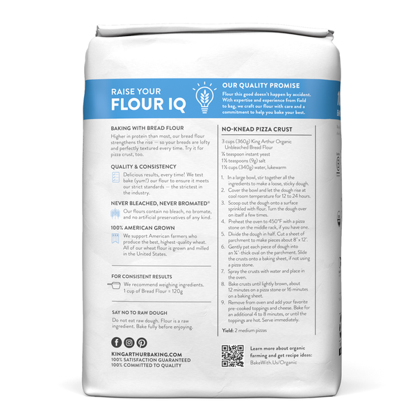 Bag of King Arthur Baking Company 100% organic unbleached bread flour, non-GMO verified, no preservatives, on a kitchen countertop.