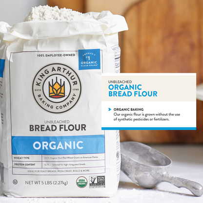 Bag of King Arthur Baking Company 100% organic unbleached bread flour with non-GMO and preservative-free labels on the packaging