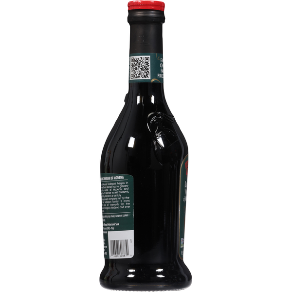 Bottle of Monari Federzoni Balsamic Vinegar of Modena in a glass bottle with a label, suitable for cooking and salad dressings.