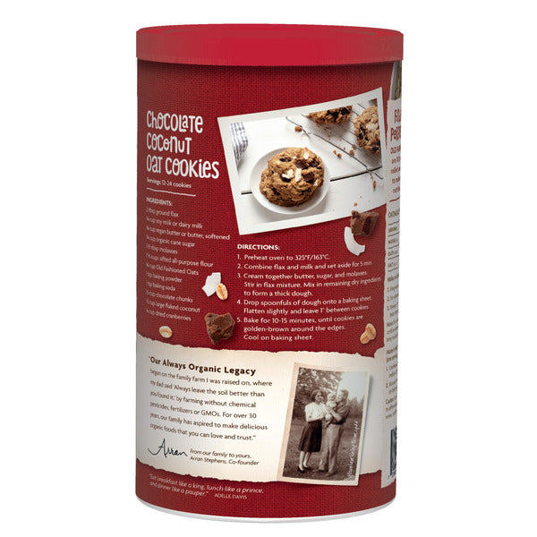 Bowl of Nature's Path Old Fashioned Oats Instant Oatmeal with steam and fresh oats on a wooden surface