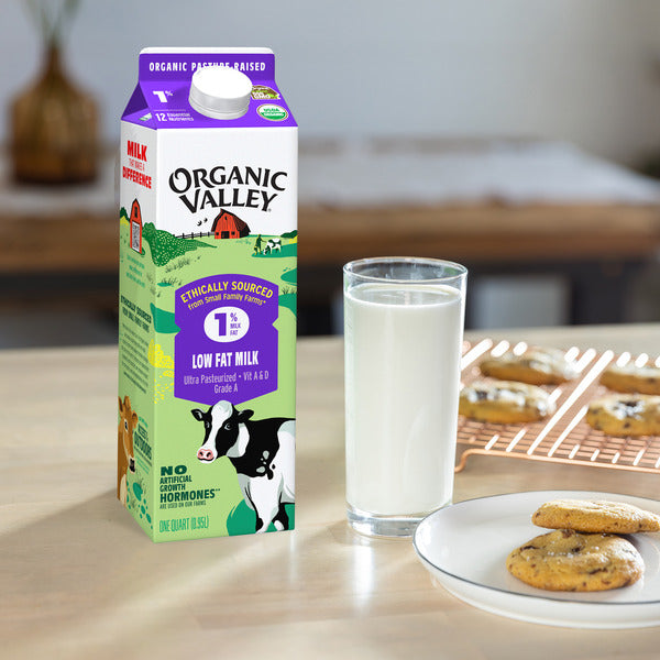 Organic Valley® Organic 1% Low Fat Milk in a carton, showing fresh milk inside and the brand label on the packaging.
