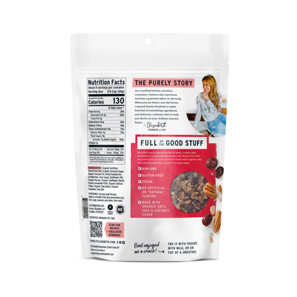 Purely Elizabeth Cranberry Pecan Ancient Grain Granola in a clear bowl showing cranberries, pecans, and crunchy granola clusters.