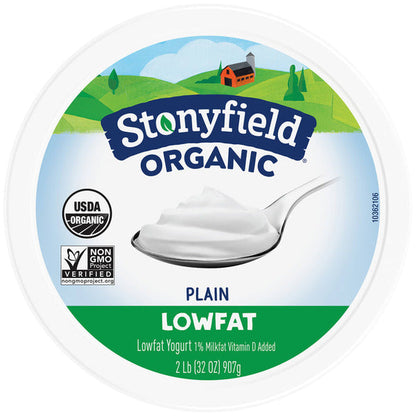 Plain Stonyfield Organic Lowfat Yogurt in a white container, showcasing the product label and smooth yogurt surface inside.