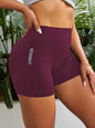 Gray female high-waist fitness shorts from DYD Sportswear, tight cycling and yoga breathable sports pants for active wear.
