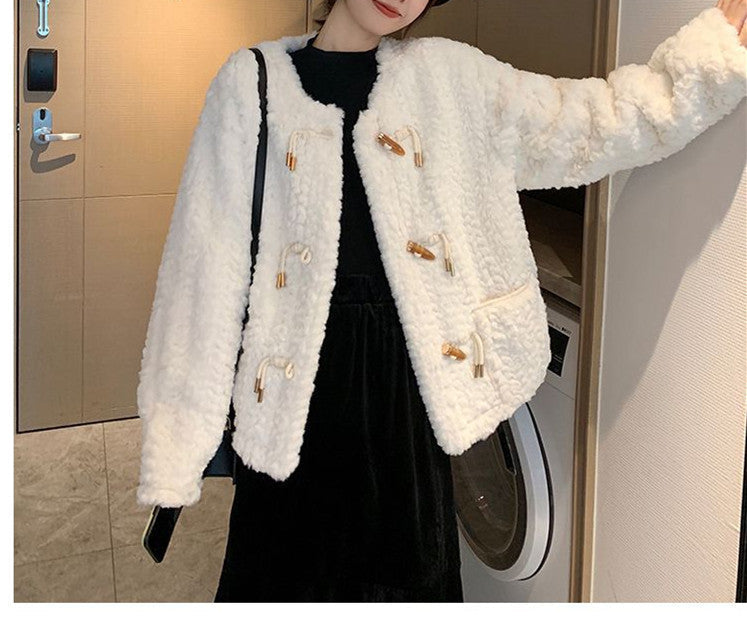 Women's lamb wool fur coat in a classic full-length design