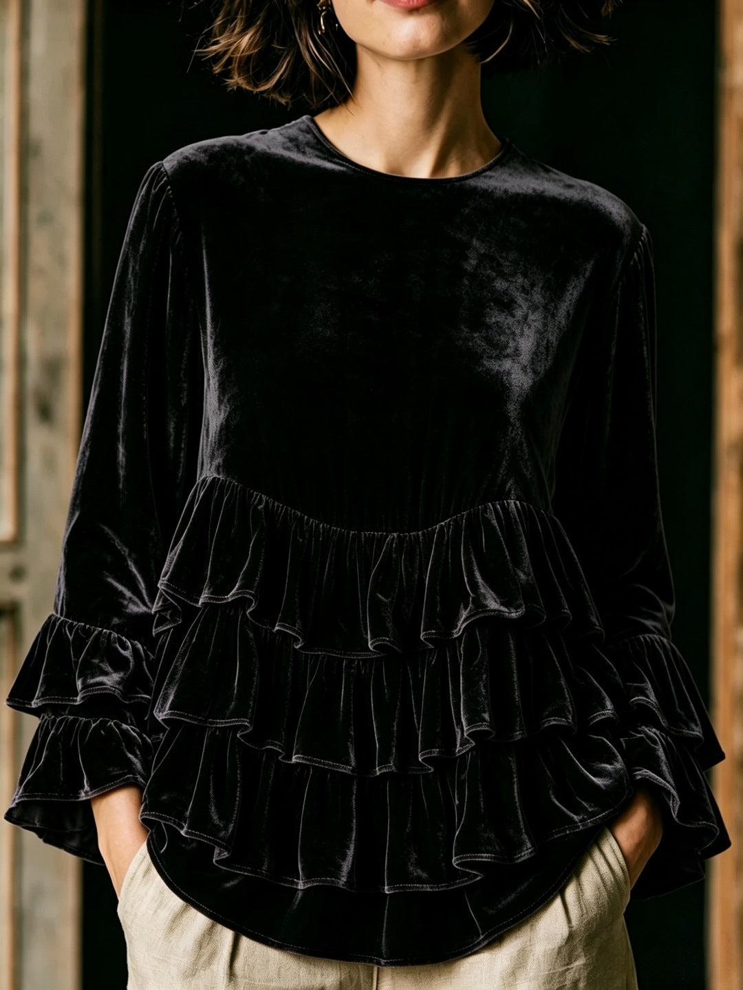 Women's long-sleeve solid-color crew-neck top with ruffle trim and loose fit