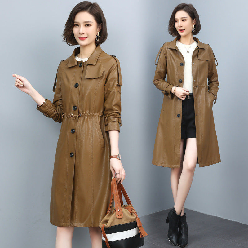 Women's sheepskin leather trench coat with turn-down collar, drawstring waist, and long solid-color design