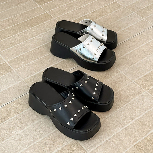 Women's silver platform slide sandals with elevated wedge, studded one-strap mule design