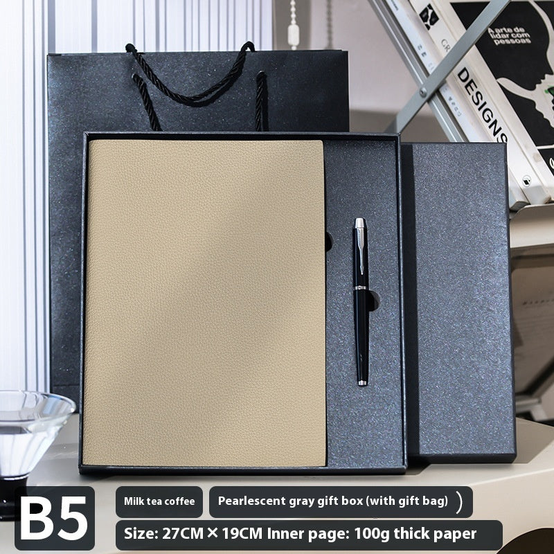 Litchi pattern soft leather covered notebook with textured finish and lined pages