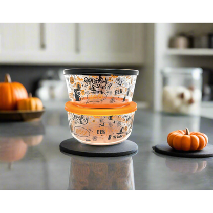 Four Dura Living Halloween glass storage containers with round shape and lids, 32oz capacity, made of clear glass.