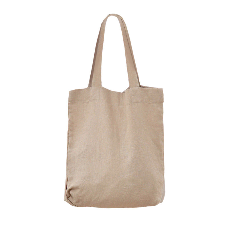 Yulu Ma eco-friendly foldable tote bag in supermarket style, shown from the front