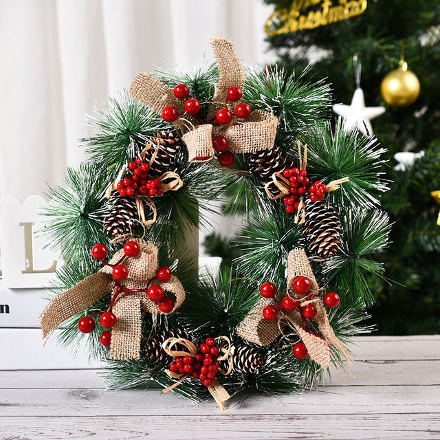 Christmas decorations garland wreath with festive greenery and ornaments