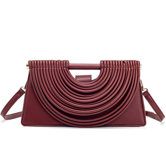 Handcrafted knotted woven noodle-shaped tote bag in textured woven design