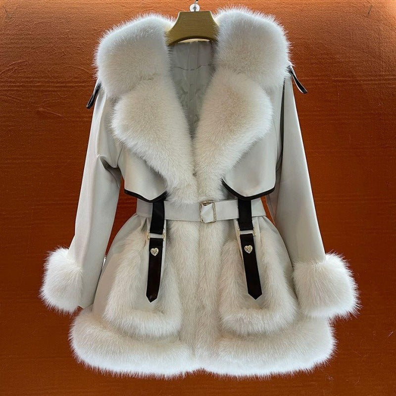 Elegant women's fur coat with a large fur collar, full-length design and plush texture