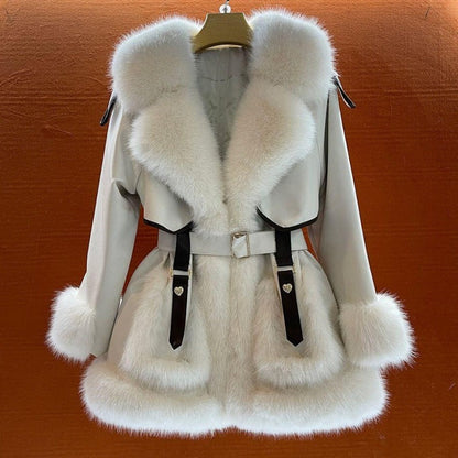 Elegant women's fur coat with a large fur collar, full-length design and plush texture