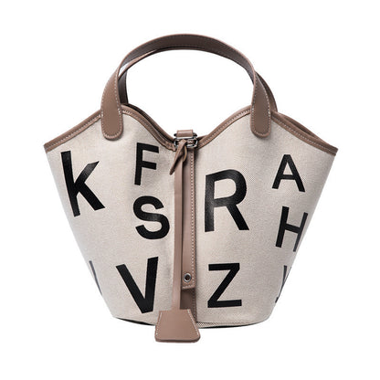Women's letter printed canvas tote bag by BACKUPMYFILESNOW® featuring stylish design and spacious interior, perfect for daily use.