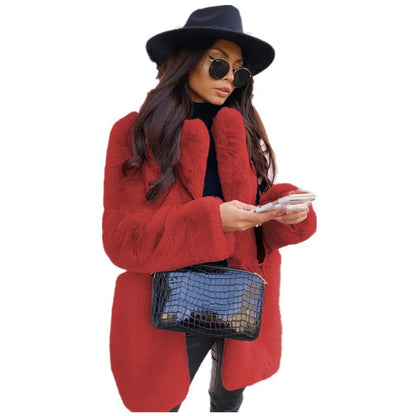 Women's long sleeve lapel faux fur coat in a solid color, front view