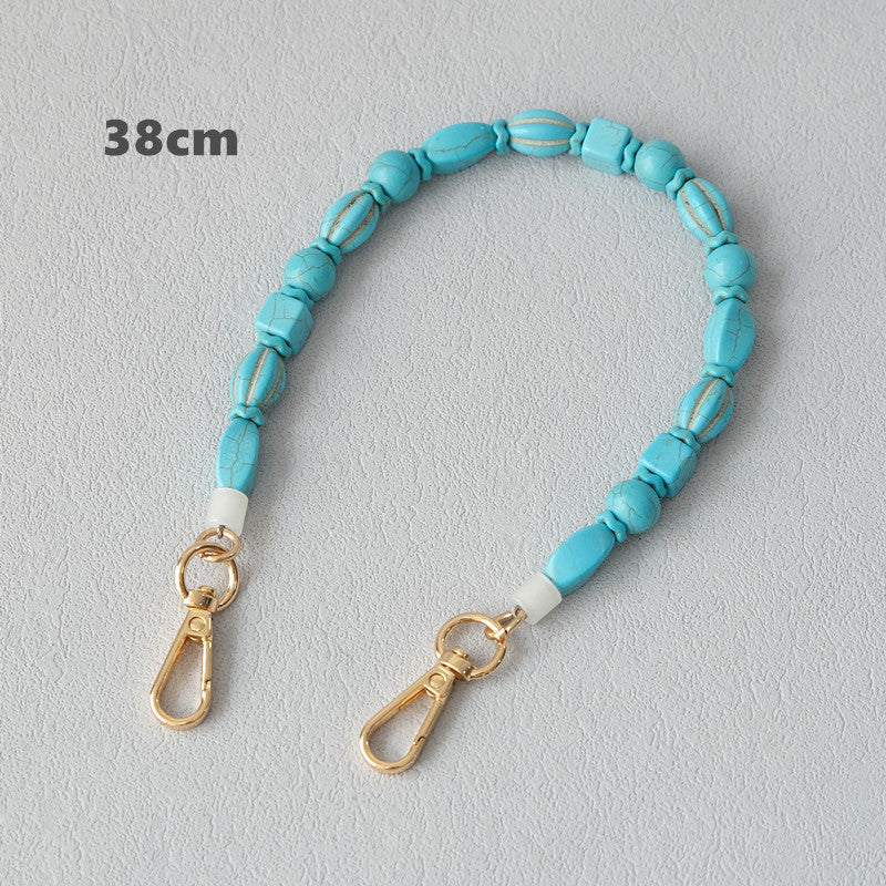 Vintage turquoise resin bag chain accessory close-up