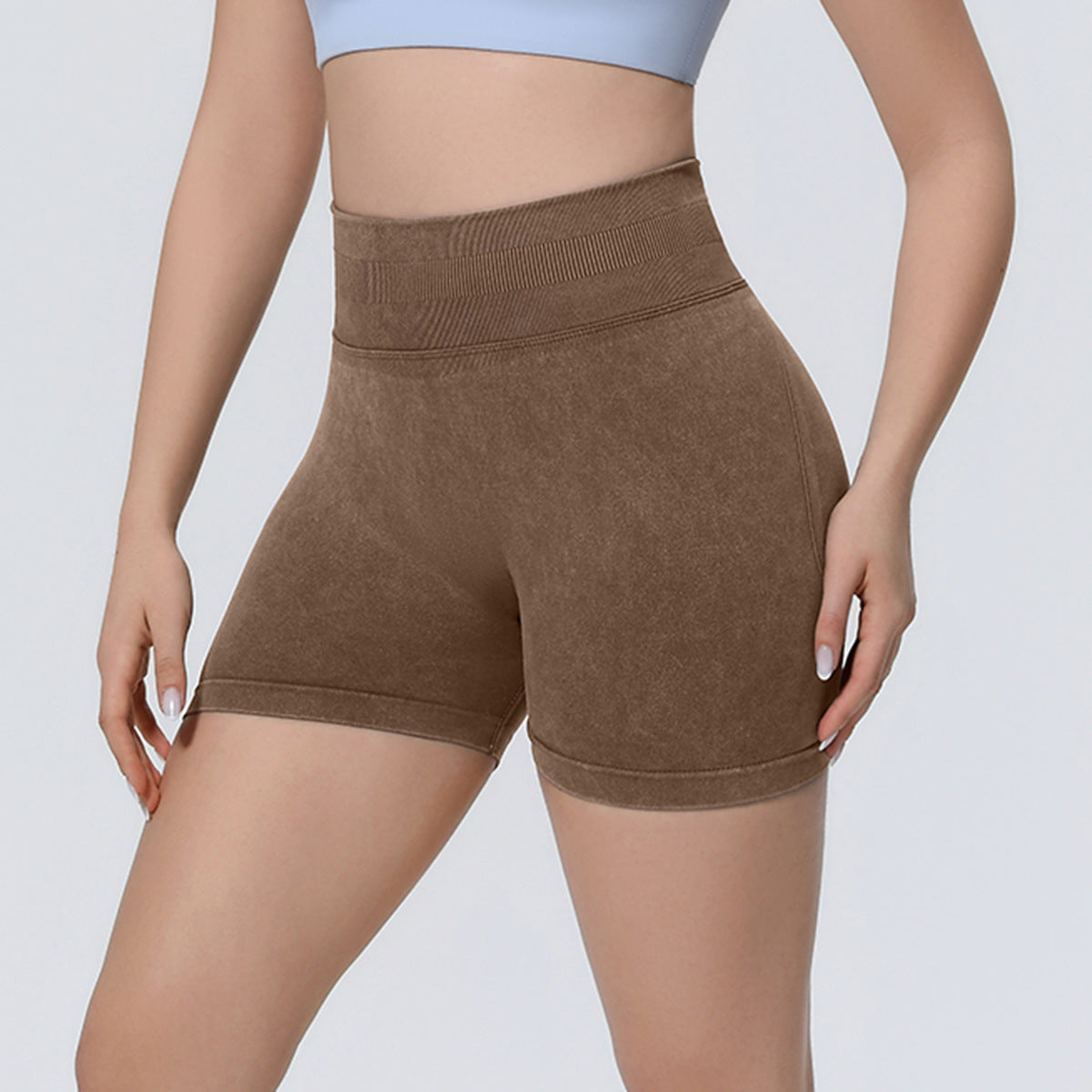 Seamless knitted sand-washed yoga shorts in a neutral tone
