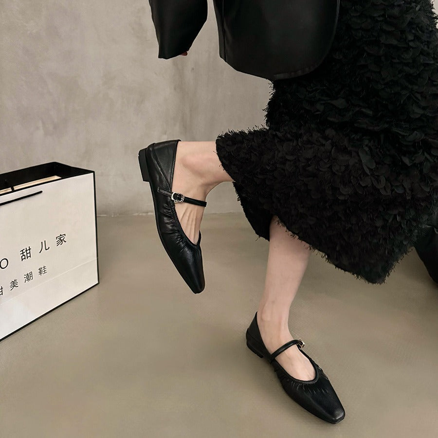 Women's silver flat dress shoes with sleek design and comfortable low-profile sole