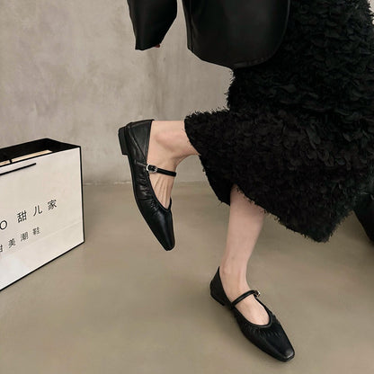 Women's silver flat dress shoes with sleek design and comfortable low-profile sole