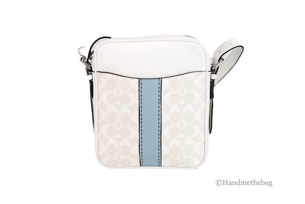 Coach Hudson 21 medium chalk trompe l'oeil print handbag with adjustable strap and top zipper closure, showcasing stylish designer details.