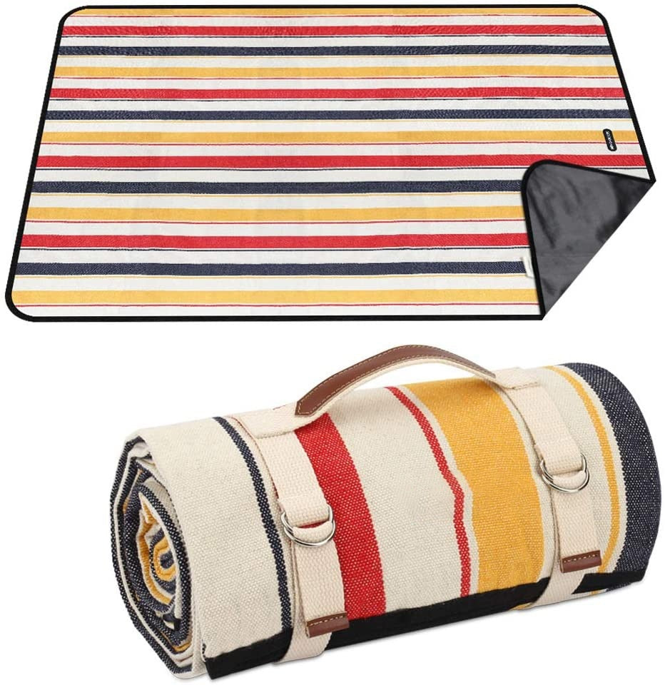 Folding canvas outdoor picnic mat and camping floor mat laid flat for outdoor use