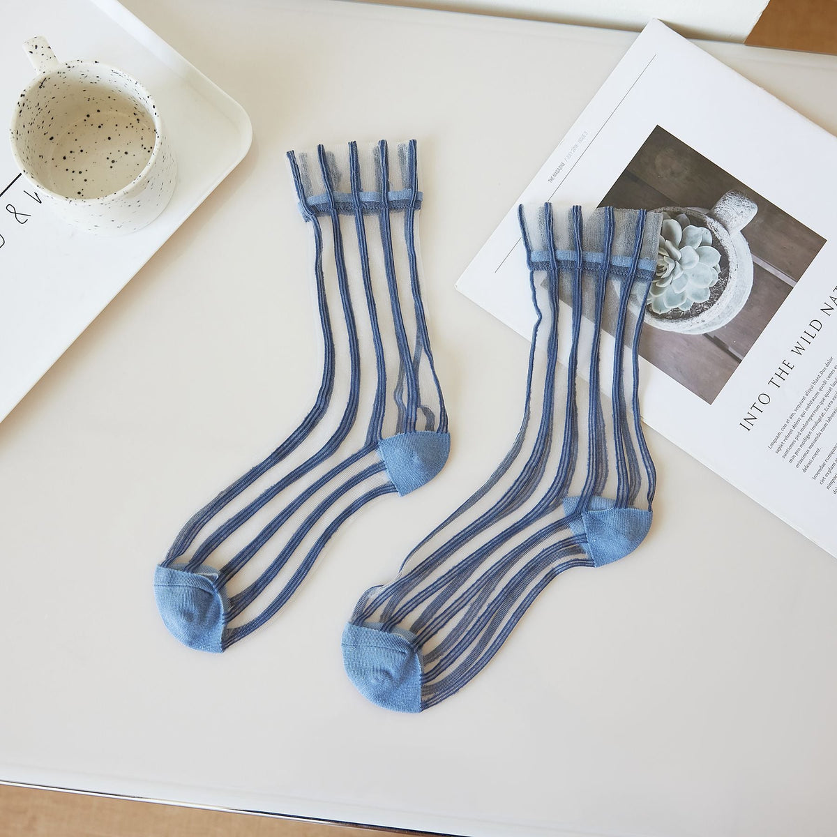 Women's thin mid-calf solid-color lace-up socks, visible front view