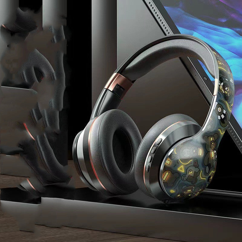 Wireless Bluetooth head-mounted e-sports headphones with cushioned ear cups and adjustable headband