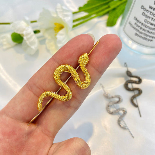Women's fashion personality simulated snake ear hanging earrings, sculptural design displayed on a plain background