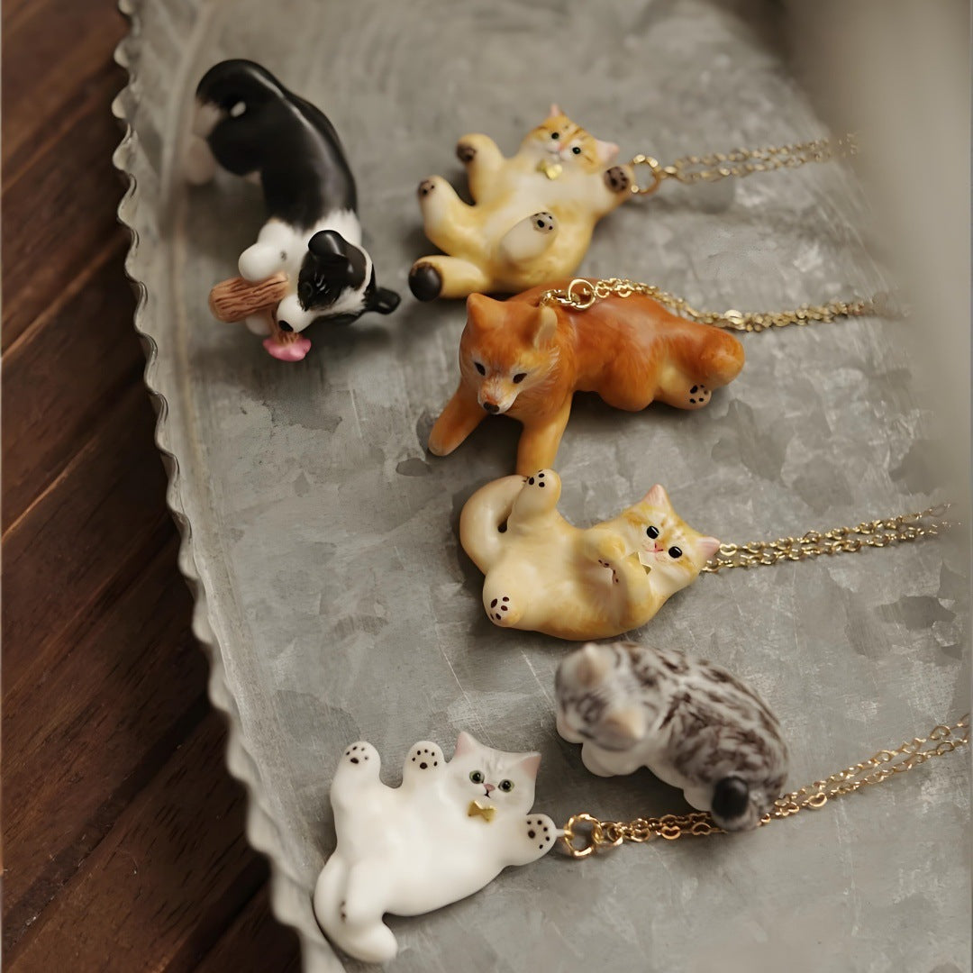 Pet cat pendant necklace with delicate clavicle chain in a simple, elegant design