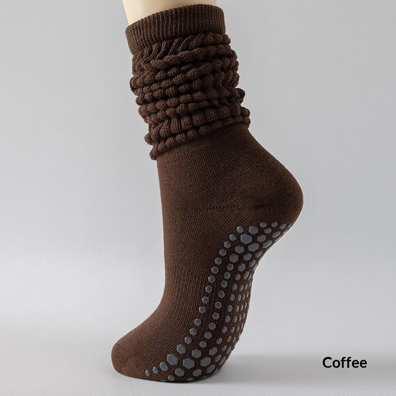 Silicone non-slip yoga socks for women, featuring grippy soles and a comfortable ankle fit