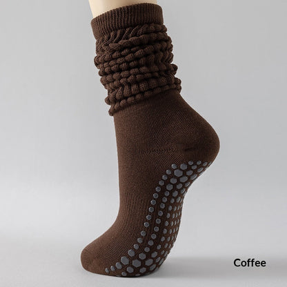 Silicone non-slip yoga socks for women, featuring grippy soles and a comfortable ankle fit