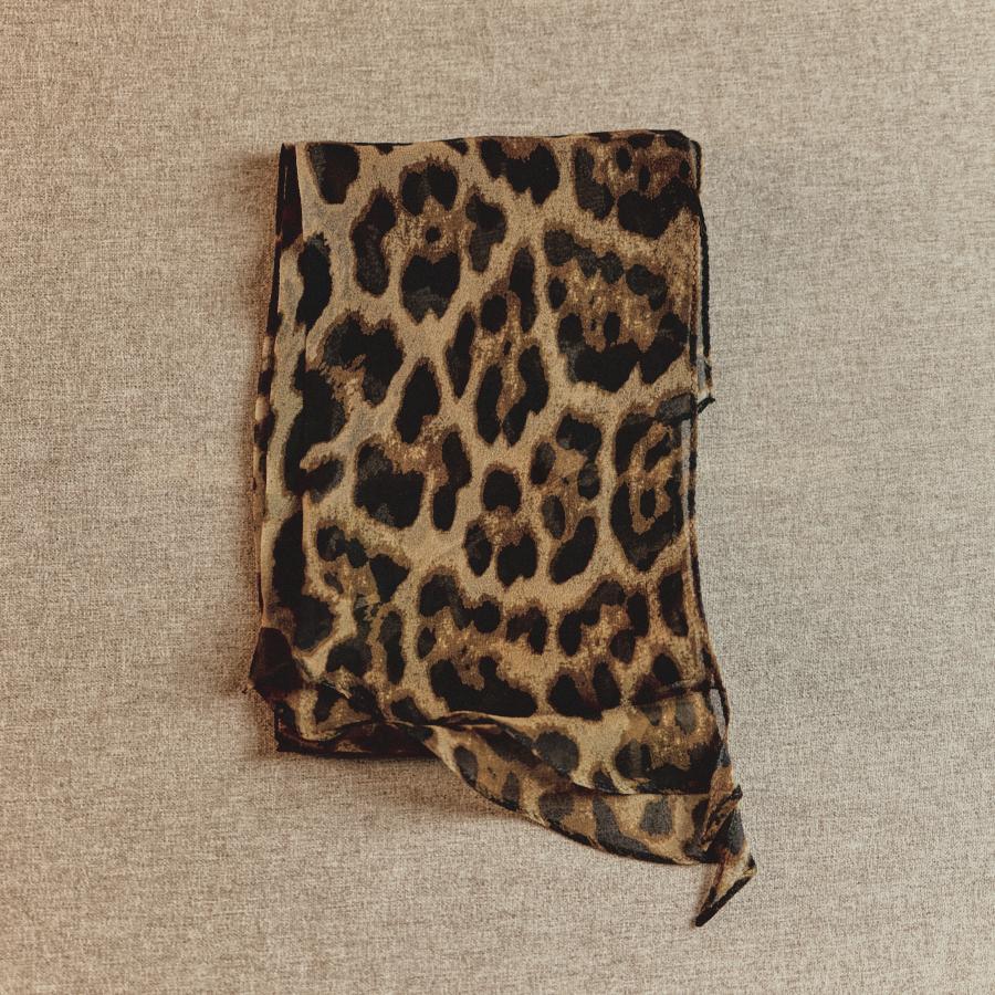 Spring lightweight narrow long silk scarf in a solid design, displayed on a white background