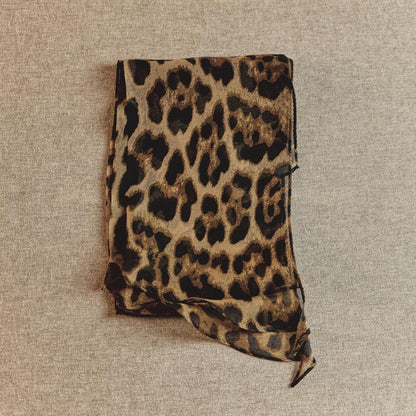 Spring lightweight narrow long silk scarf in a solid design, displayed on a white background