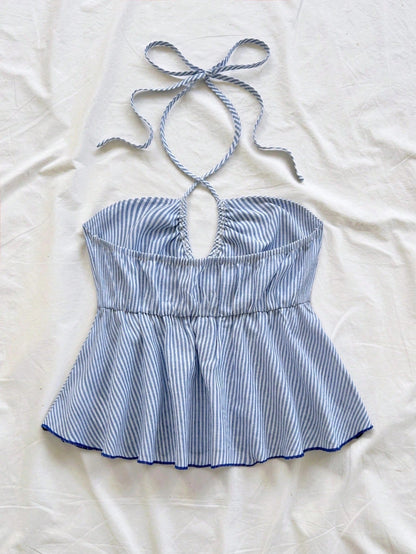 One-shoulder backless striped tie-top with an asymmetrical strap and adjustable back ties