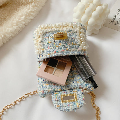 Children's diamond lattice chain crossbody bag with crisscross pattern and chain strap