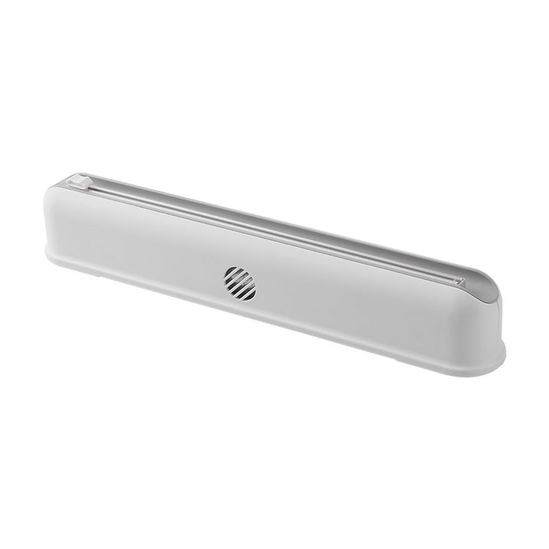 Wall-mounted cling film box with suction cups and adjustable cutter for kitchen storage