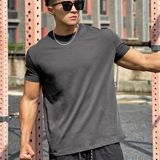 Muscle Sports loose cotton fitness short sleeve men's shirt in a relaxed athletic style