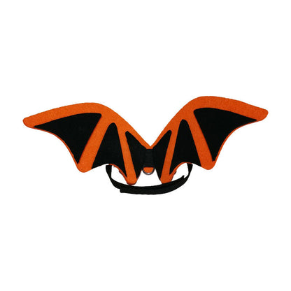 Halloween pet costume with bat wings, bow tie, and hat accessories for dogs and cats