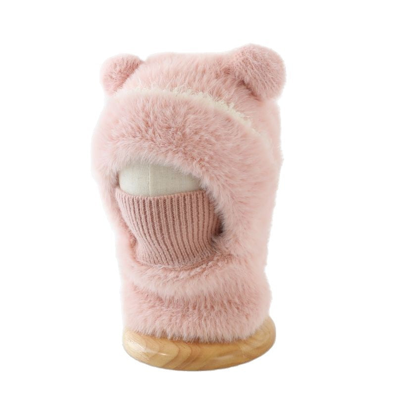 Warm windproof knitted wool hat with earflaps in a cozy winter design